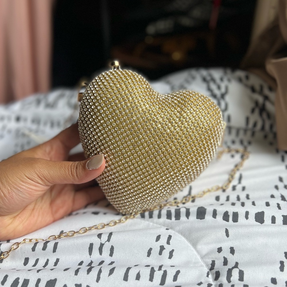 Gold sparkly heart shaped purse